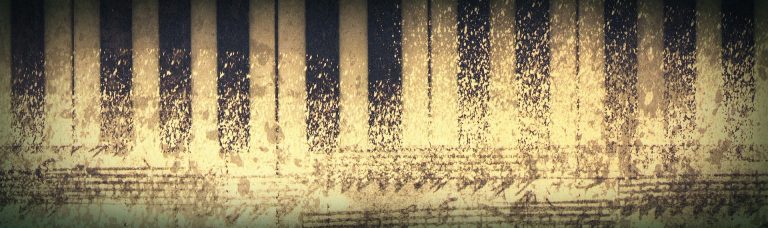 Piano keyboard and score banner 768x228