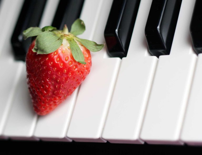 strawberry on piano 768x589