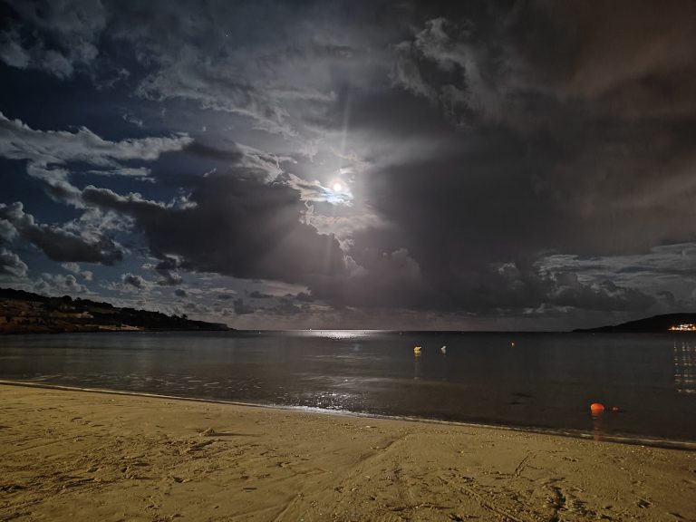 Full moon, sea and beach in the dark